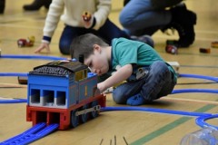 Children playing with giant Thomas tunnel