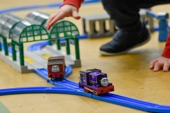 Trains pulling through tunnel